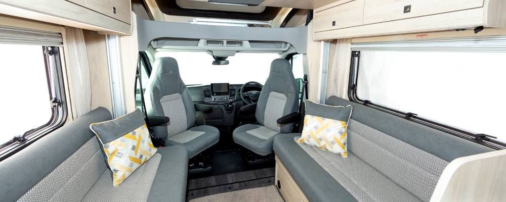 Front Lounge with Swivelling Cab Pews & Twin-Seat Settees