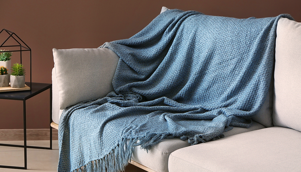Creative Ways to Style Throws on Your Sofa