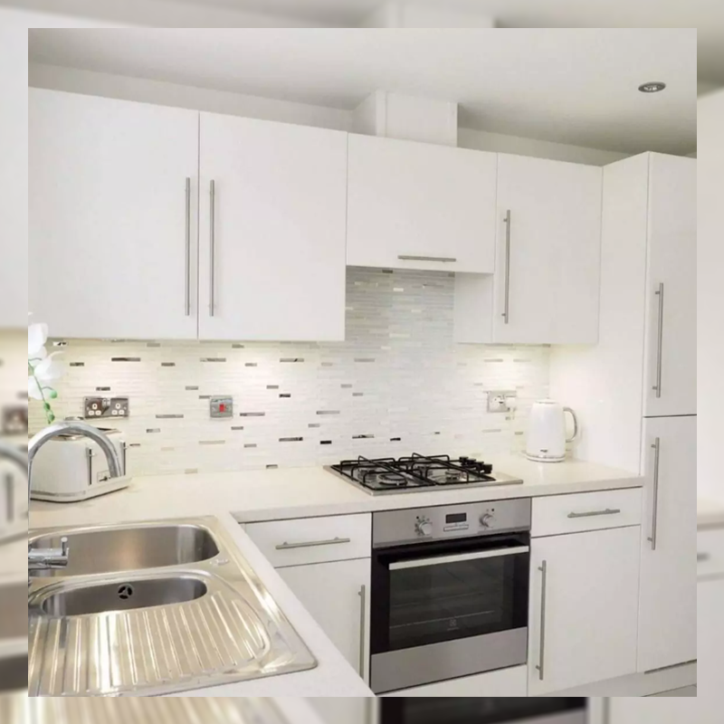 white dominant kitchen with under cabinet lighting